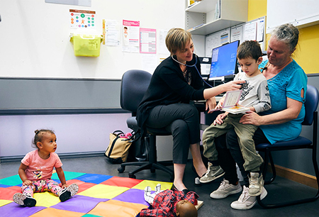 Doctor examining a child at Flinders Medical Centre
